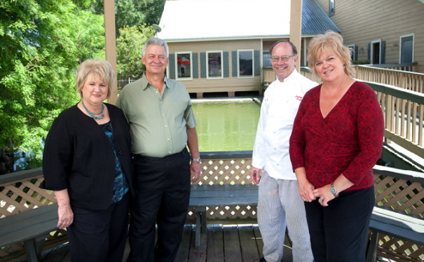 Landry's Owners Dave and Grace Landry, Alex Patout and Manager Elaine Buteau