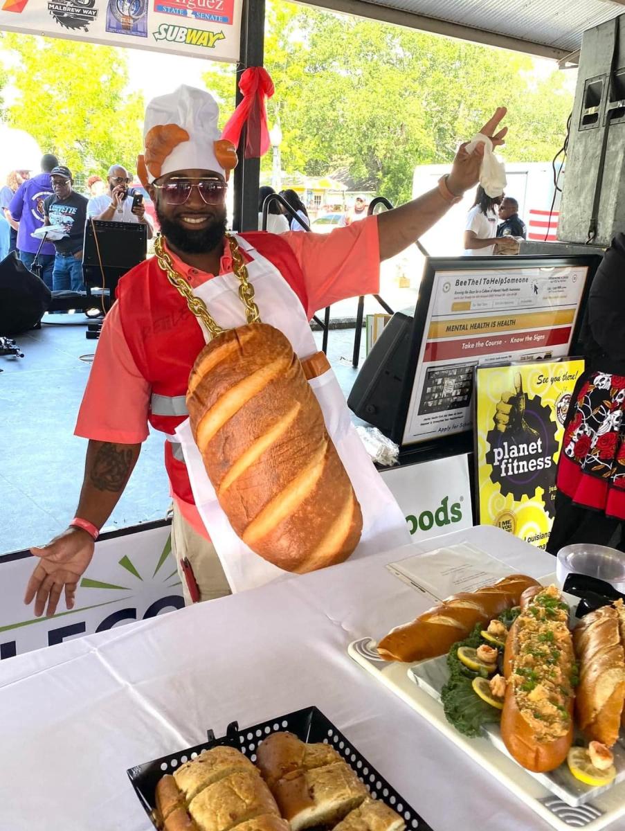 Man dressed up in fun outfit for French Bread Festival