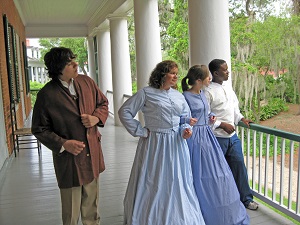Reenactors in period dress at Shadows on the Teche plantation home in New Iberia Louisiana