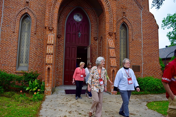 Visitors exist a church on Dave Robicheaux tour