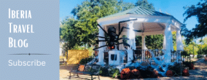 Subscribe to Iberia Travel's Blog - with photo of Bouligny Plaza gazebo decorated for Halloween
