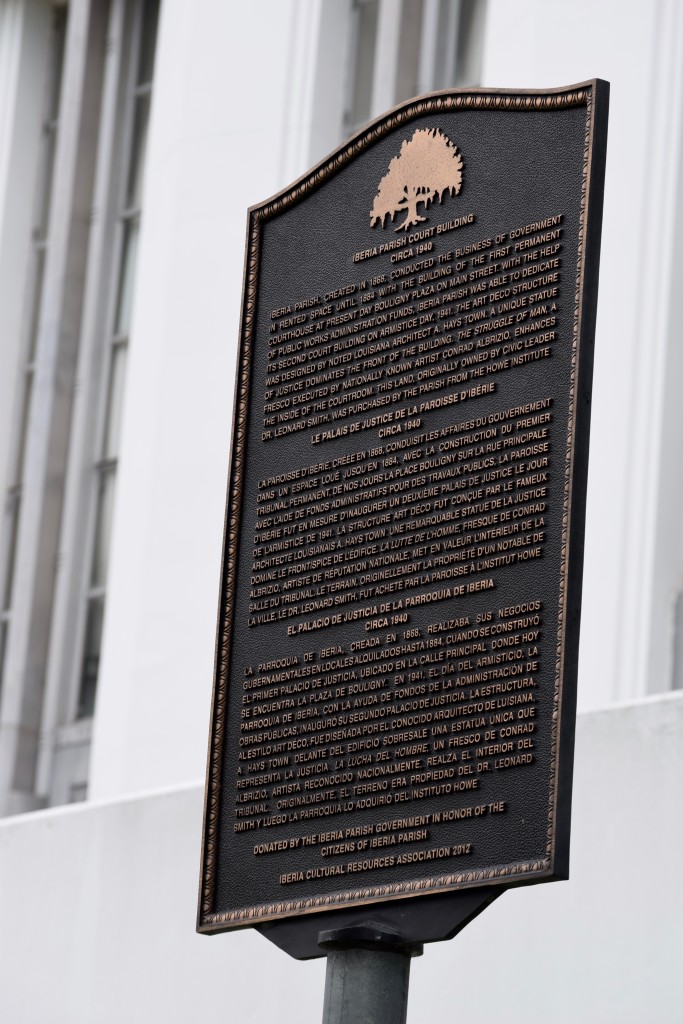 trilingual marker plaque in front of iberia parish courthouse